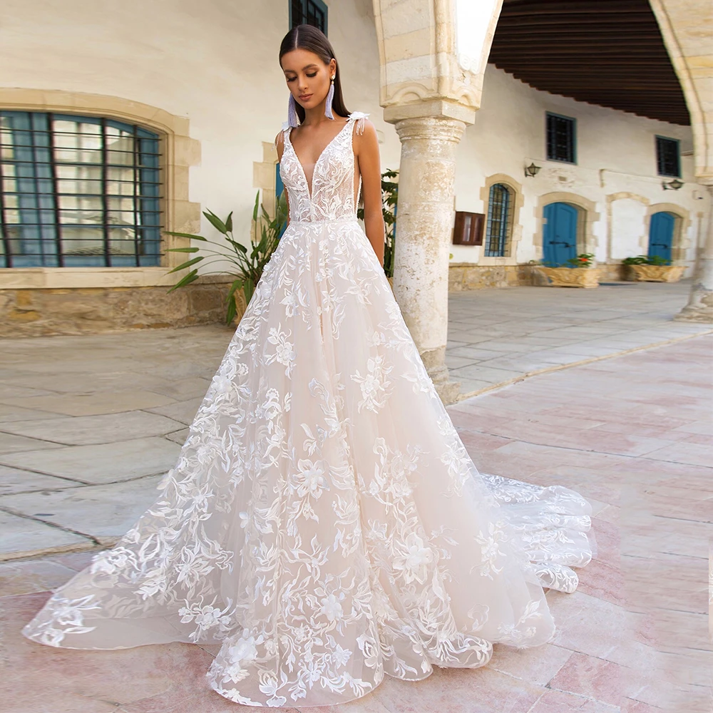 Gorgeous A-line Tulle Appliques Lace Wedding Dress for Bride with V-neck Tassel Sleeveless Bridal Gowns with Sweep Train