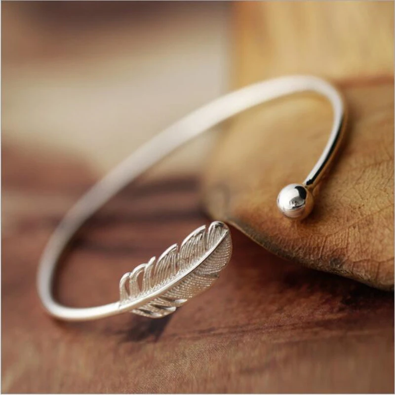 New Fashion 925 Sterling Silver Jewelry Not Allergic High-quality Female Simple Feather Small Ball Open Bracelets   SL009