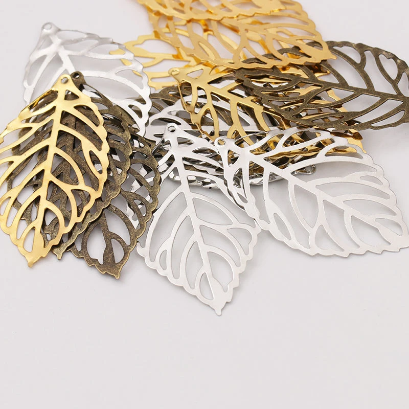 50pcs Craft Hollow Leaves Pendant Jewelry Accessories Gold Charm Filigree Jewelry Making Plated Vintage for Hair Comb Hot New