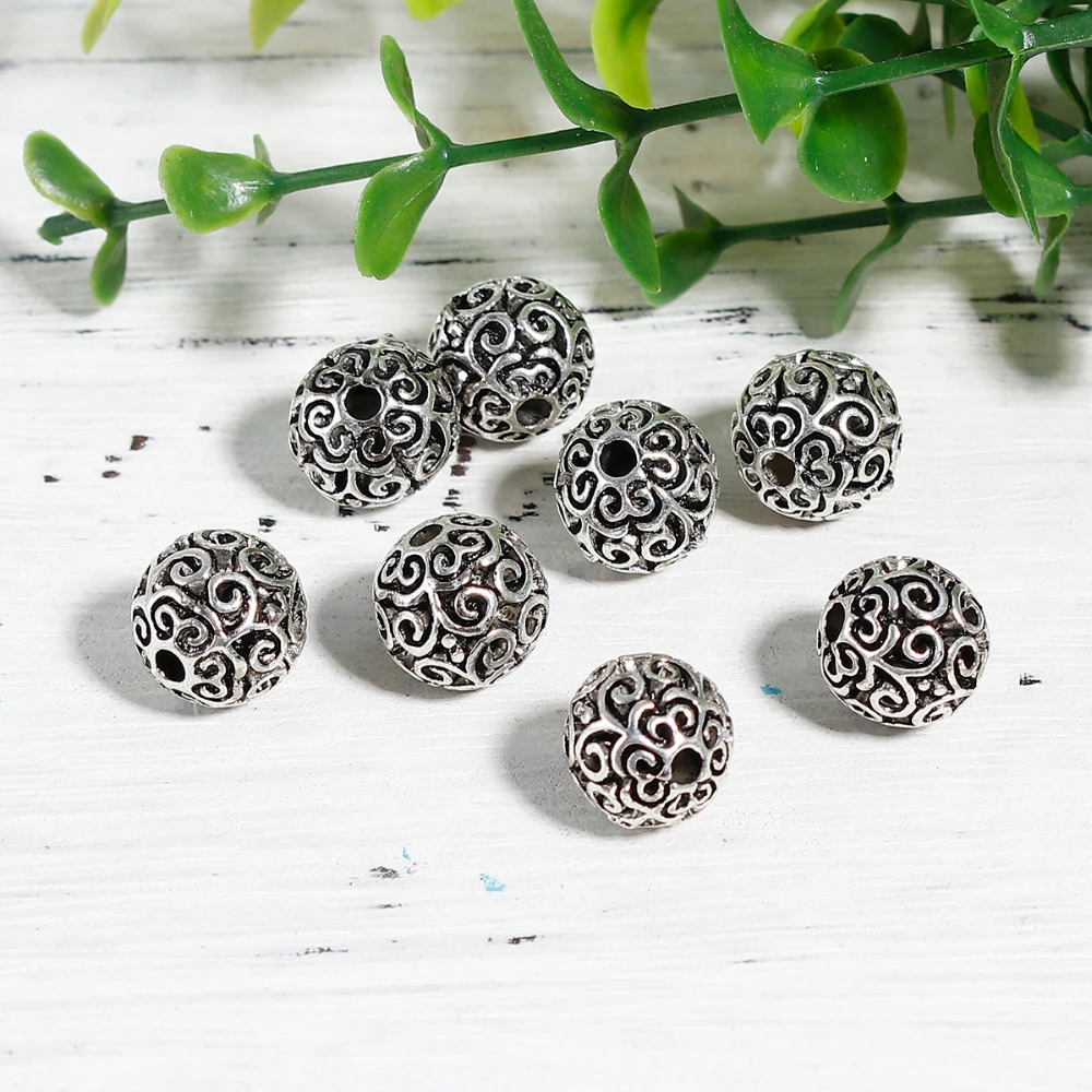 DoreenBeads Zinc Based Alloy silver color Spacer Beads Round Filigree DIY Components About 12mm Dia, Hole: Approx 2.5mm, 5 PCs