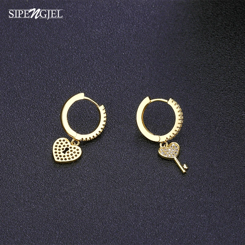 SIPENGJEL Fashion Punk Love Heart Dangle Huggies Hoop Earrings Hip Hop Geometric Asymmetry Earrings For Women Jewelry Gift 2021