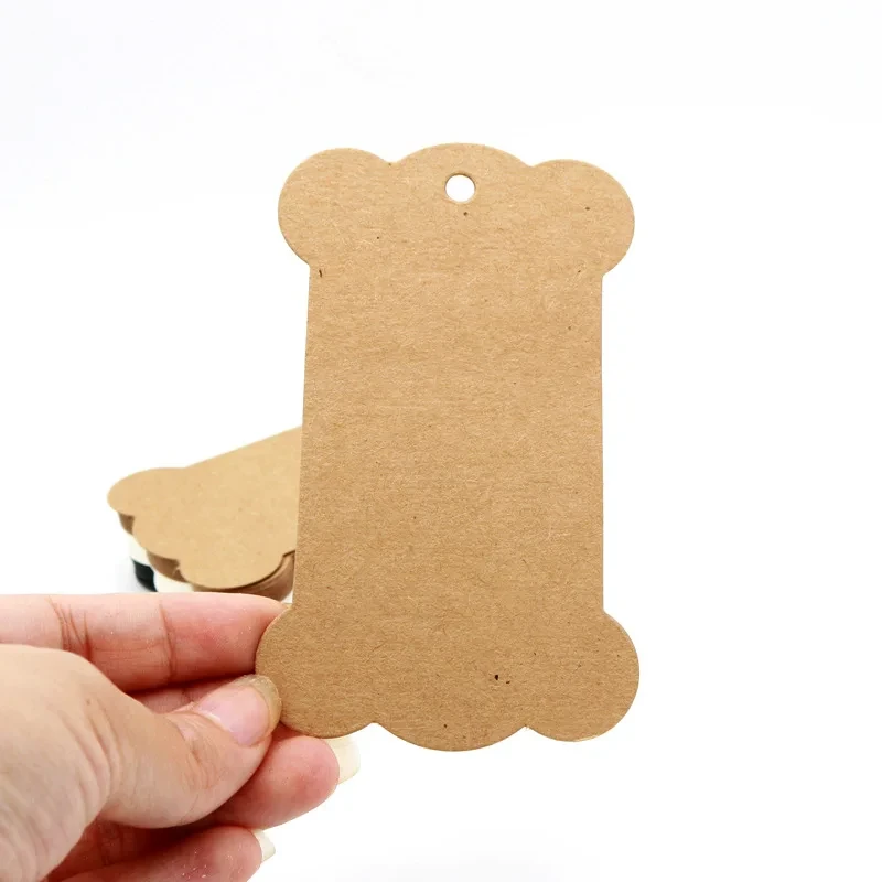 50pcs/Lot 6.2x10.5cm Kraft Blank Bone Shape Packaging Hang Tags Wedding/Birthday Party Candy Boxes Price Tags Labels
